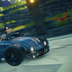 Goofy rides in a race car.